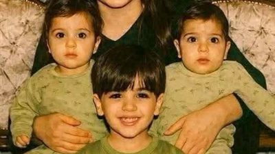 ام تنشر صورتها مع اولادها وهم في عام 2003